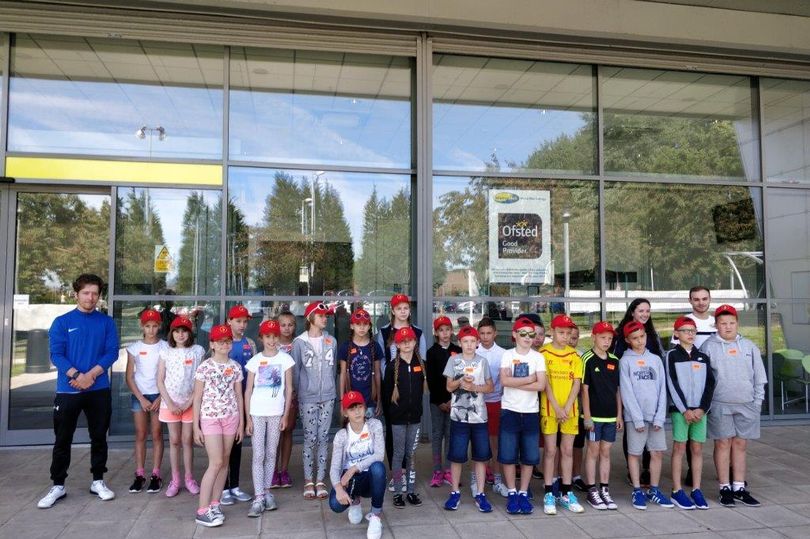 A group picture of Chernobyl Children at their trip to Wirral Met's The Oval Campus