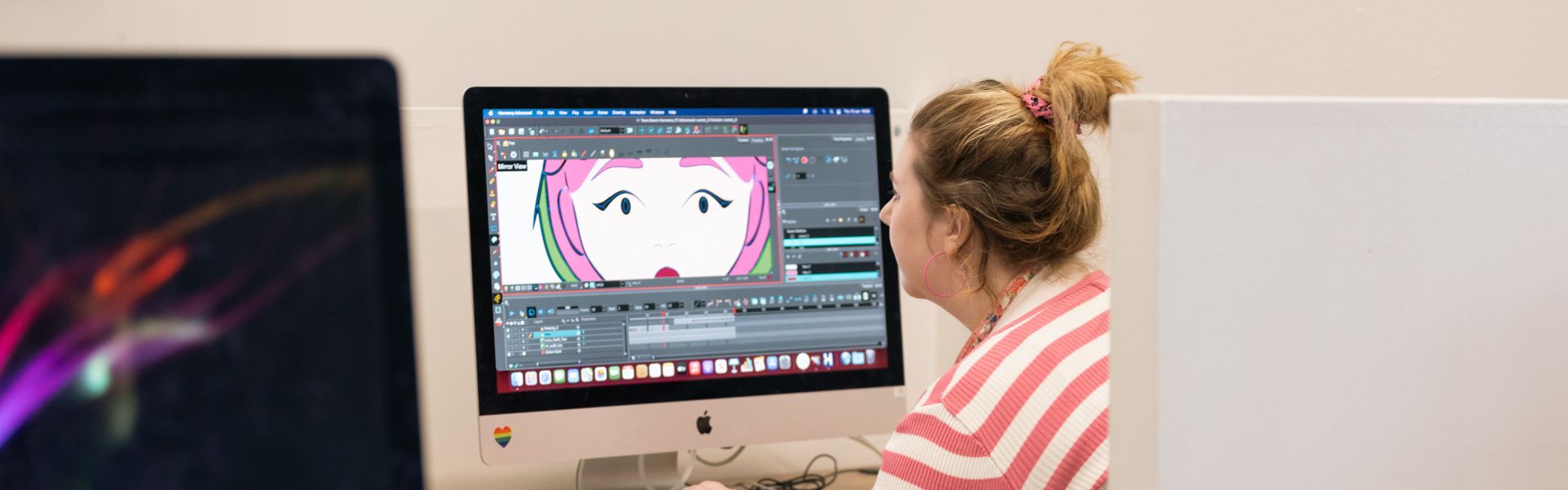 Illustration with Animation student creating an animation on a mac computer