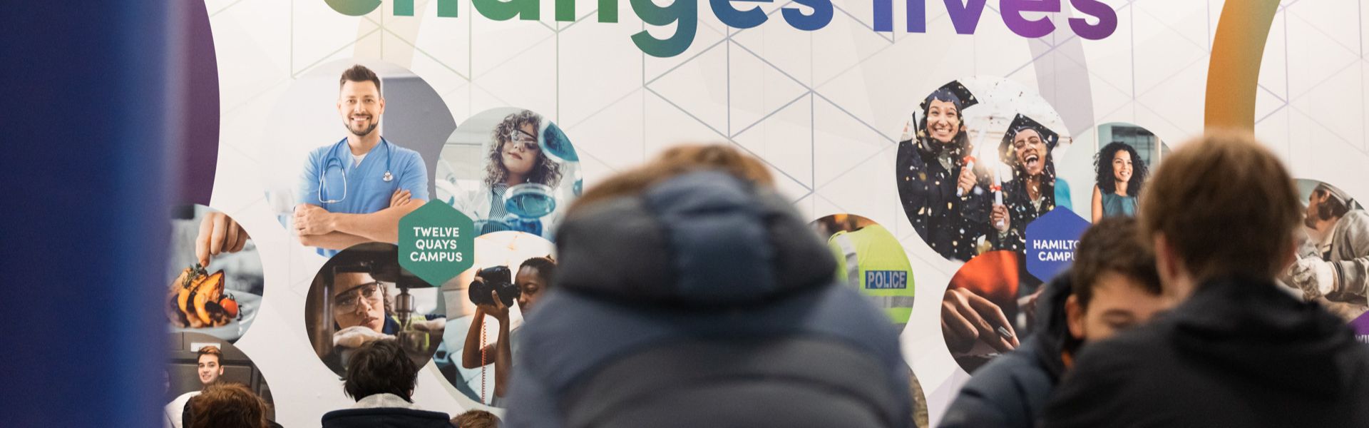 People sat in the breakout area of Twelve Quays campus