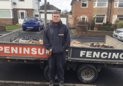 Wirral Met Supported Intern standing outside of a Peninsula Fencing g outside 