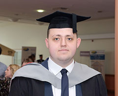 Science Full Time Case Study Adam Ravenscroft Wearing Graduation Outfit