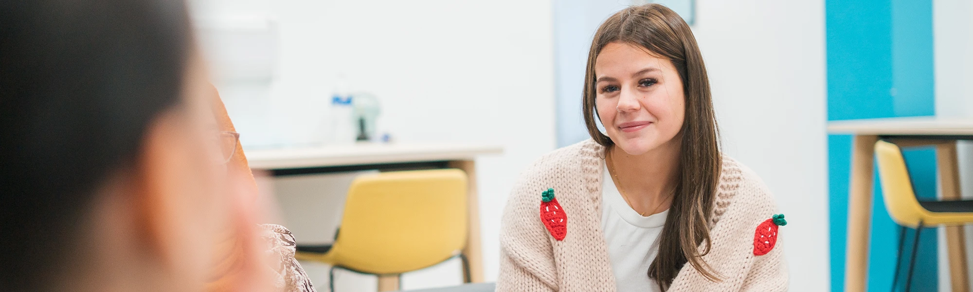 Wirral Met student speaking with careers advisers